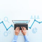 web analytics and digital marketing. top view of business man using laptop.